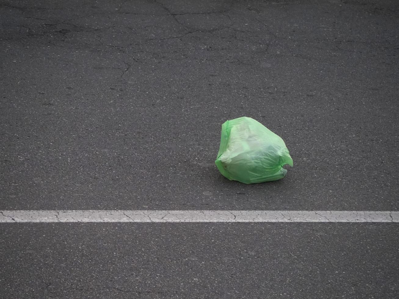 plastic bag in the road photo
