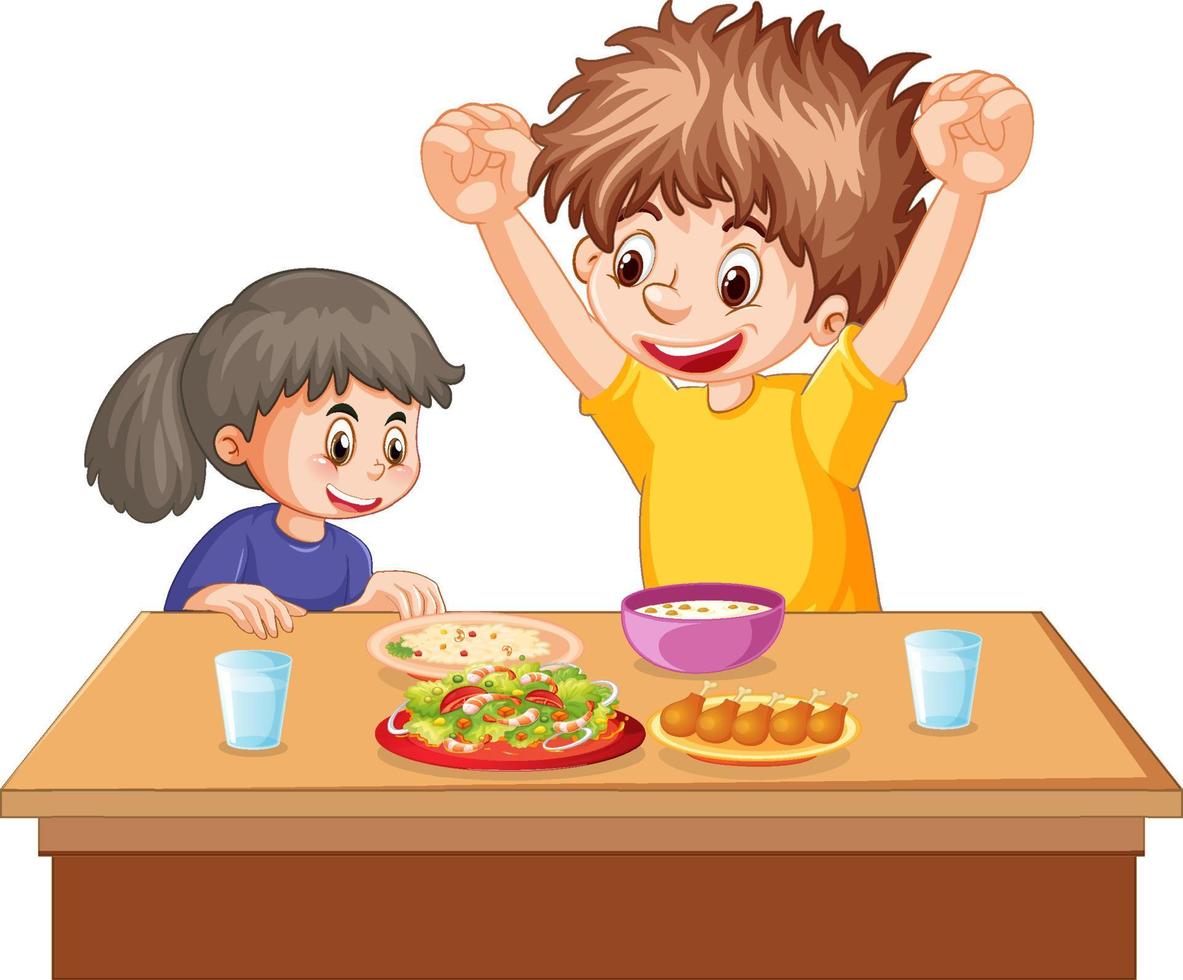 niños felices comiendo en la mesa vector
