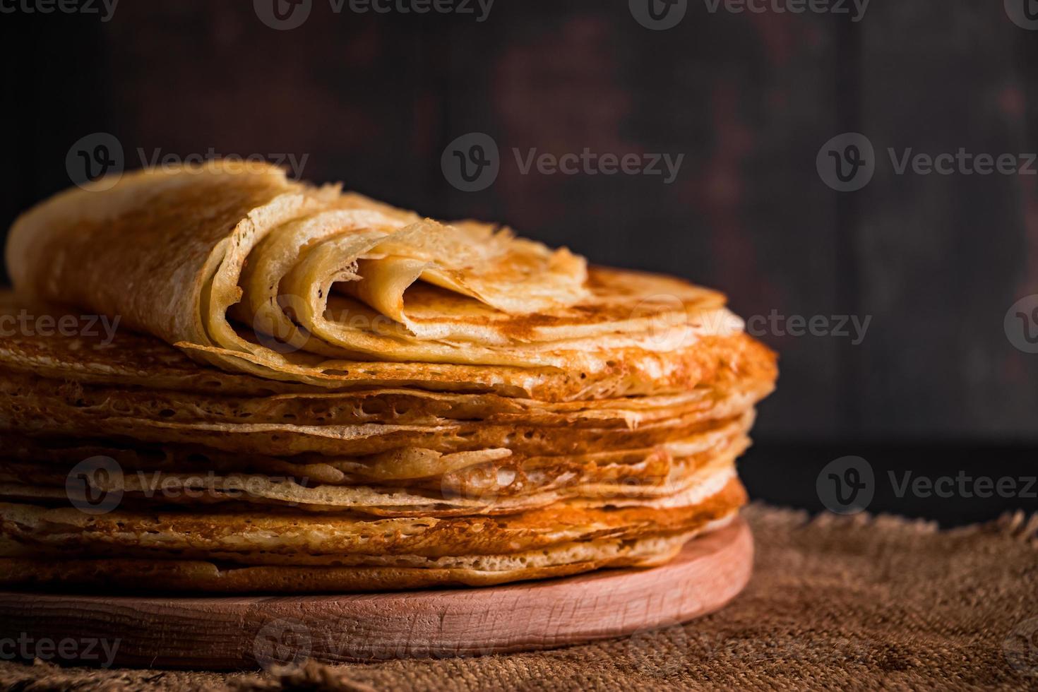 Traditional Russian food - thin pancakes. photo