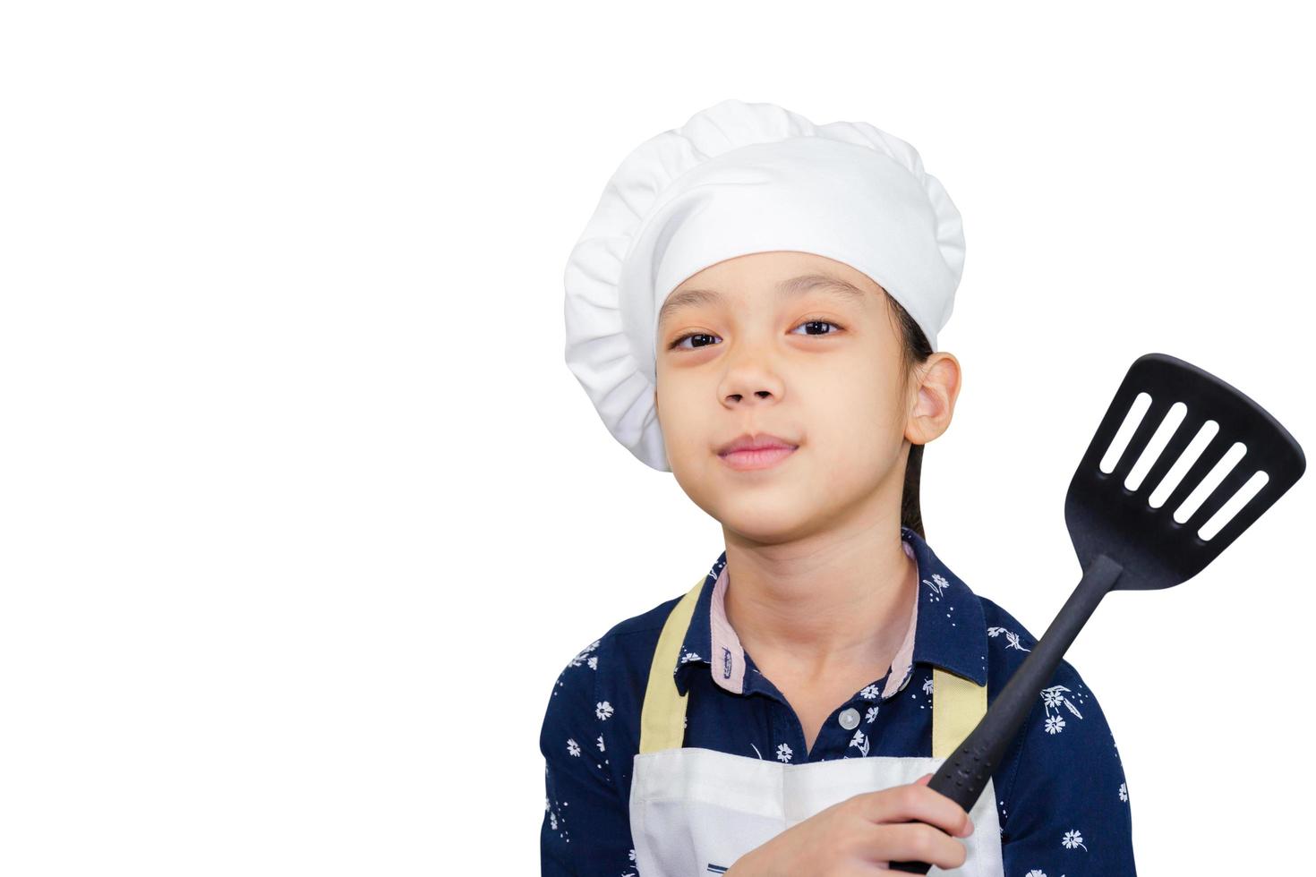 concepto de carrera de ensueño, retrato de niño feliz chef con camino de recorte sobre fondo blanco foto