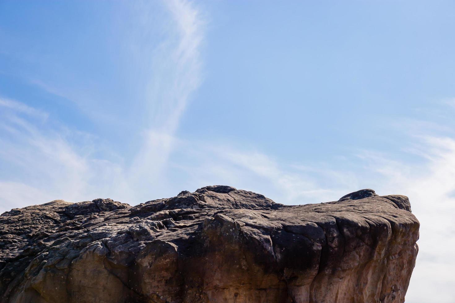 The large stone with copy space blue sky background for concept photo