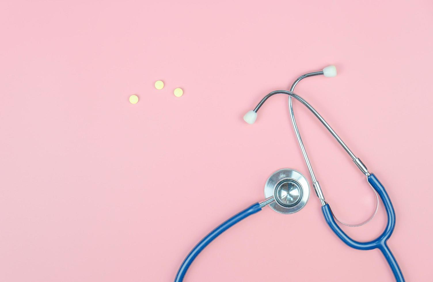 Top view with copy space of Stethoscope on the pink background, Medical and Healthy concept photo