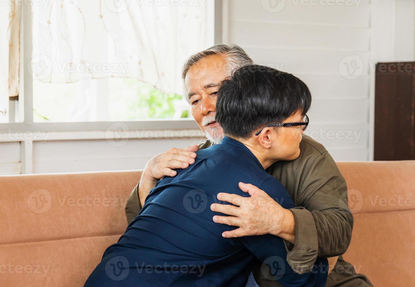 Senior asian father give advice adult son in living room, Happiness family concepts photo