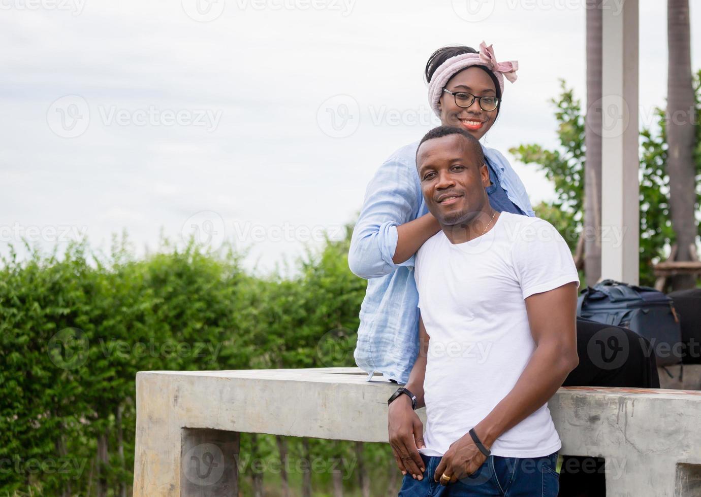 Cheerful african american couple sitting relax and looking at camera, happiness family concepts photo