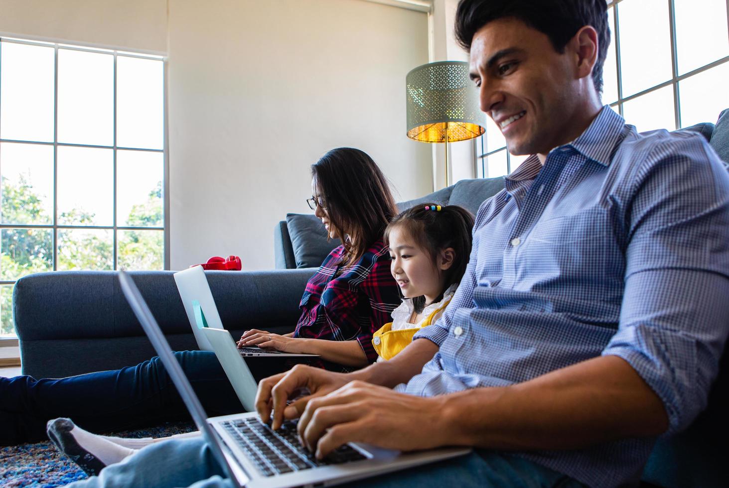 Three member of family working together photo