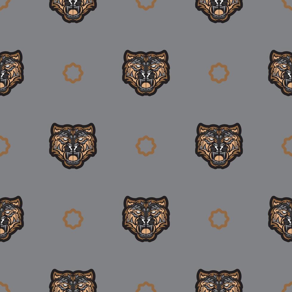 Seamless pattern with tiger face in colored Polynesian style. Good for clothing and textiles. Vector illustration.