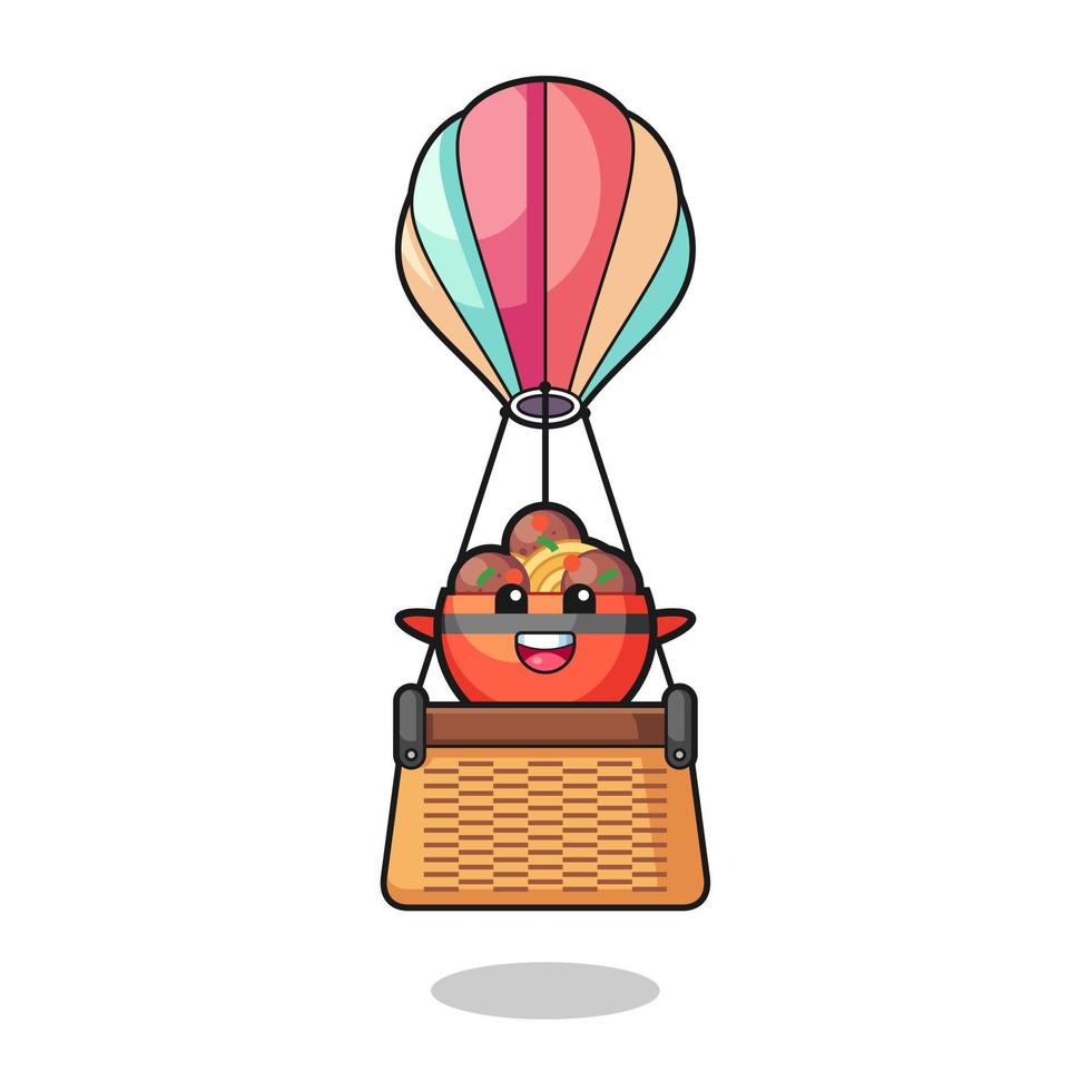 mascota del tazón de albóndigas montando un globo aerostático vector