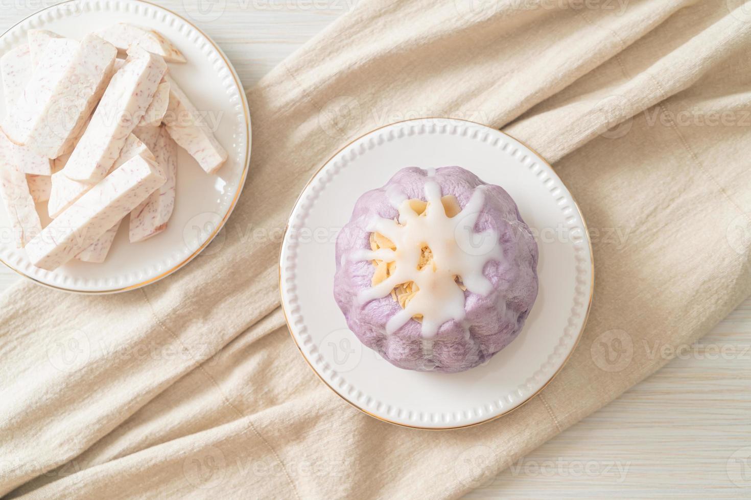 taro bun with white sugar cream and nut photo