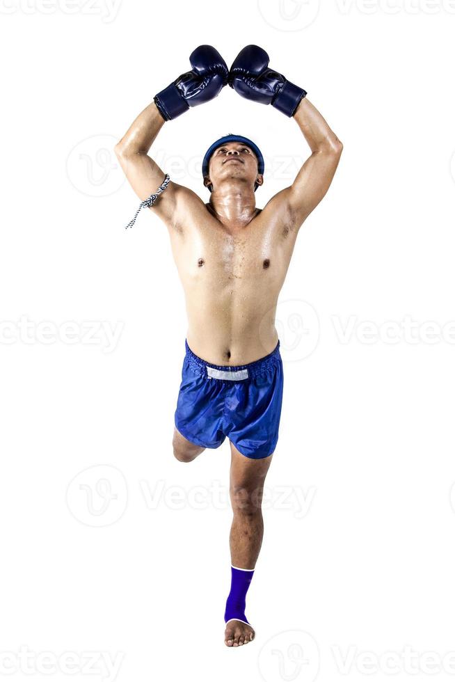 Thai boxer with thai boxing action, isolated on white background photo