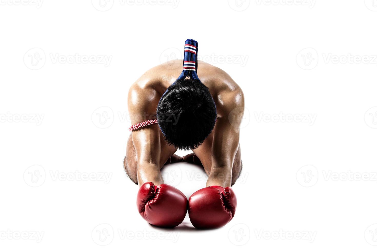 Muay thai, Asian man exercising thai boxing isolated on white background photo