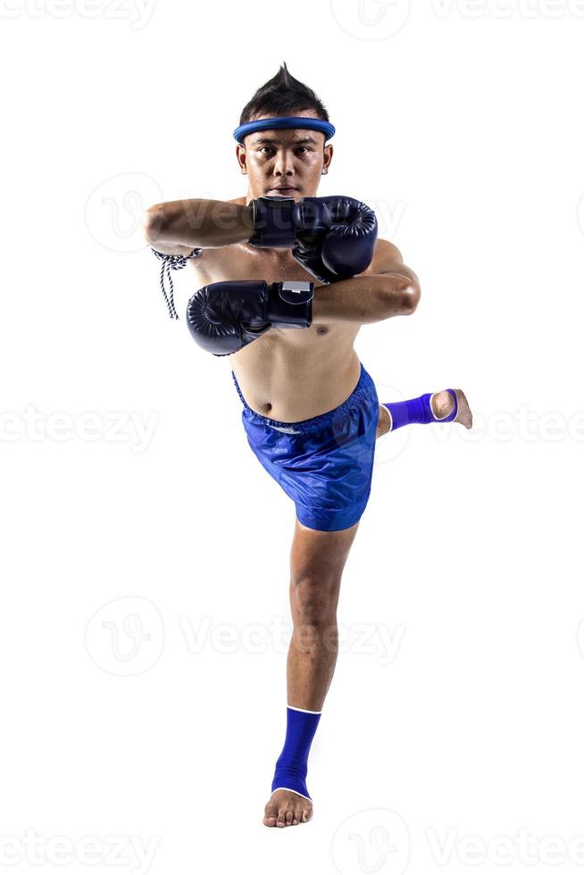 Thai boxer with thai boxing action, isolated on white background photo