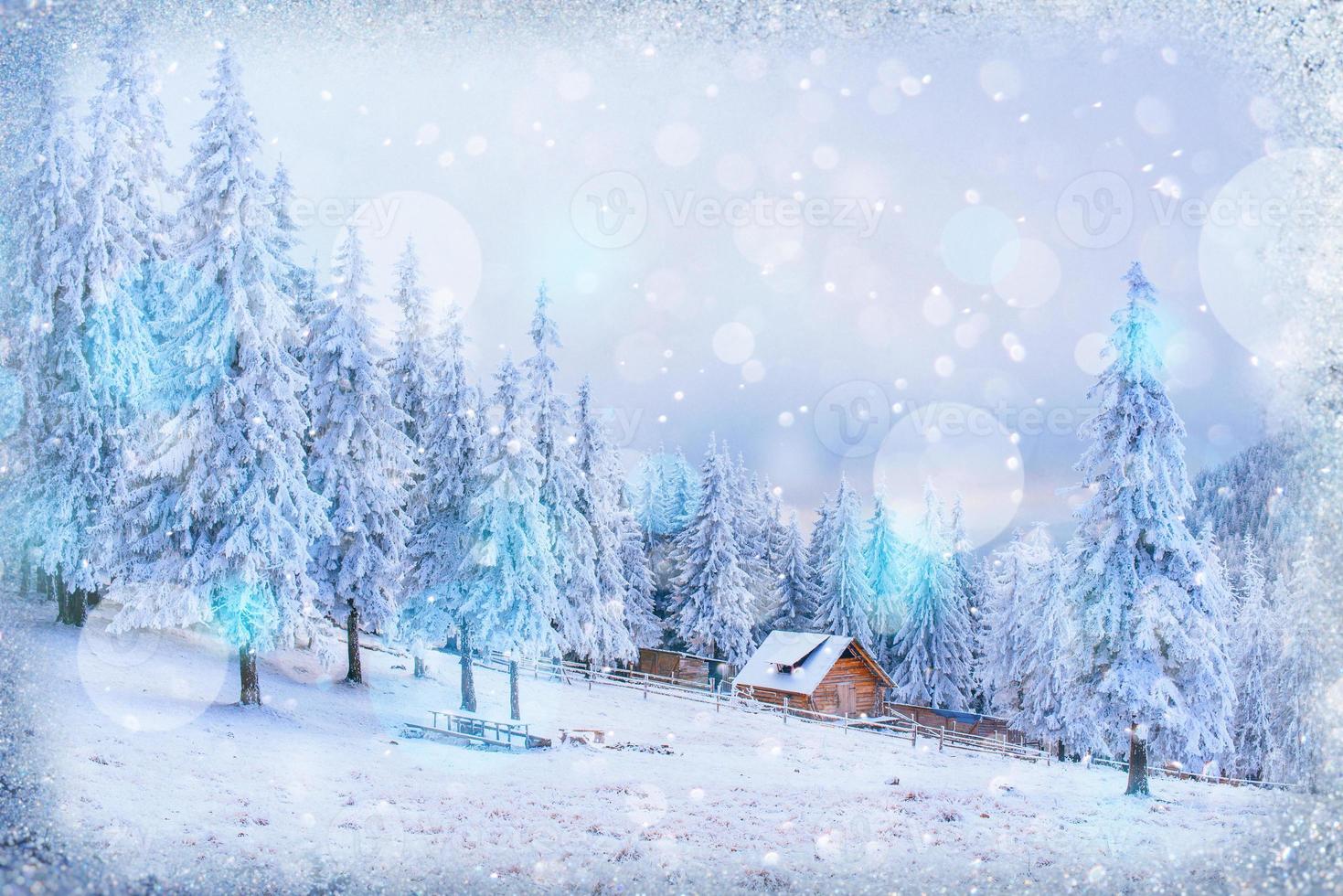 chalets in the mountains at sunset. Winter greetings photo