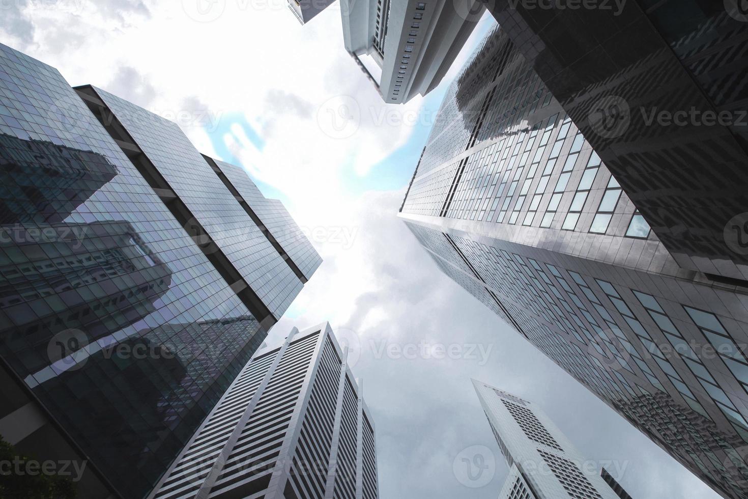 View of modern business skyscrapers glass and sky view landscape of commercial building in central city photo