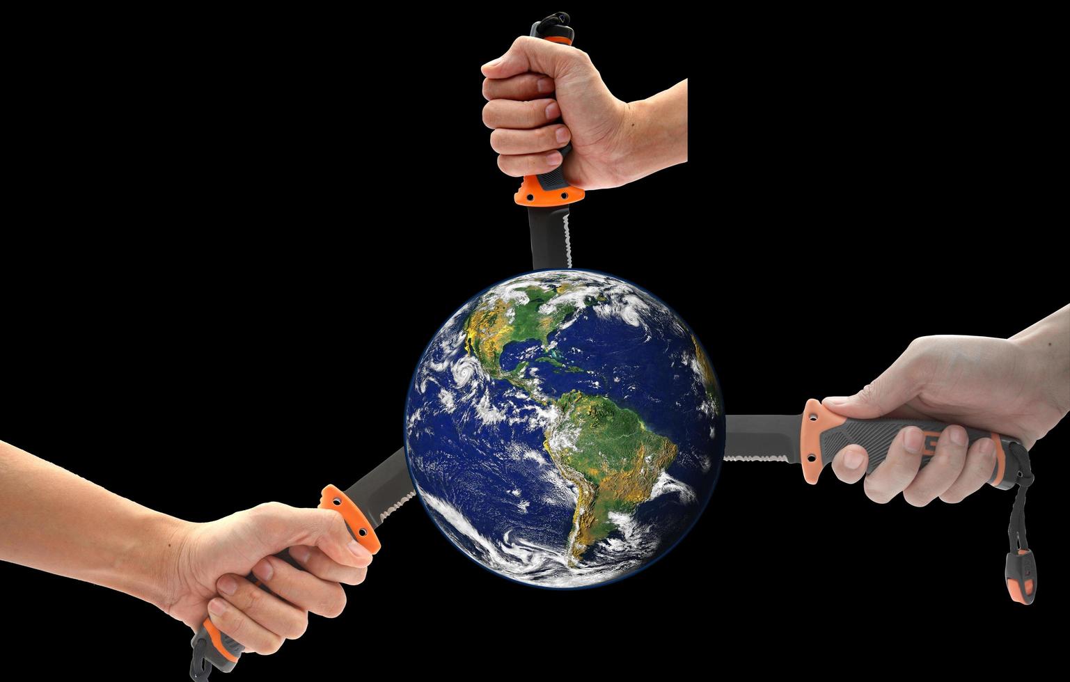 Concept, Hand holding a knife to stab the world. Violence in the world. Elements of this image furnished by NASA photo