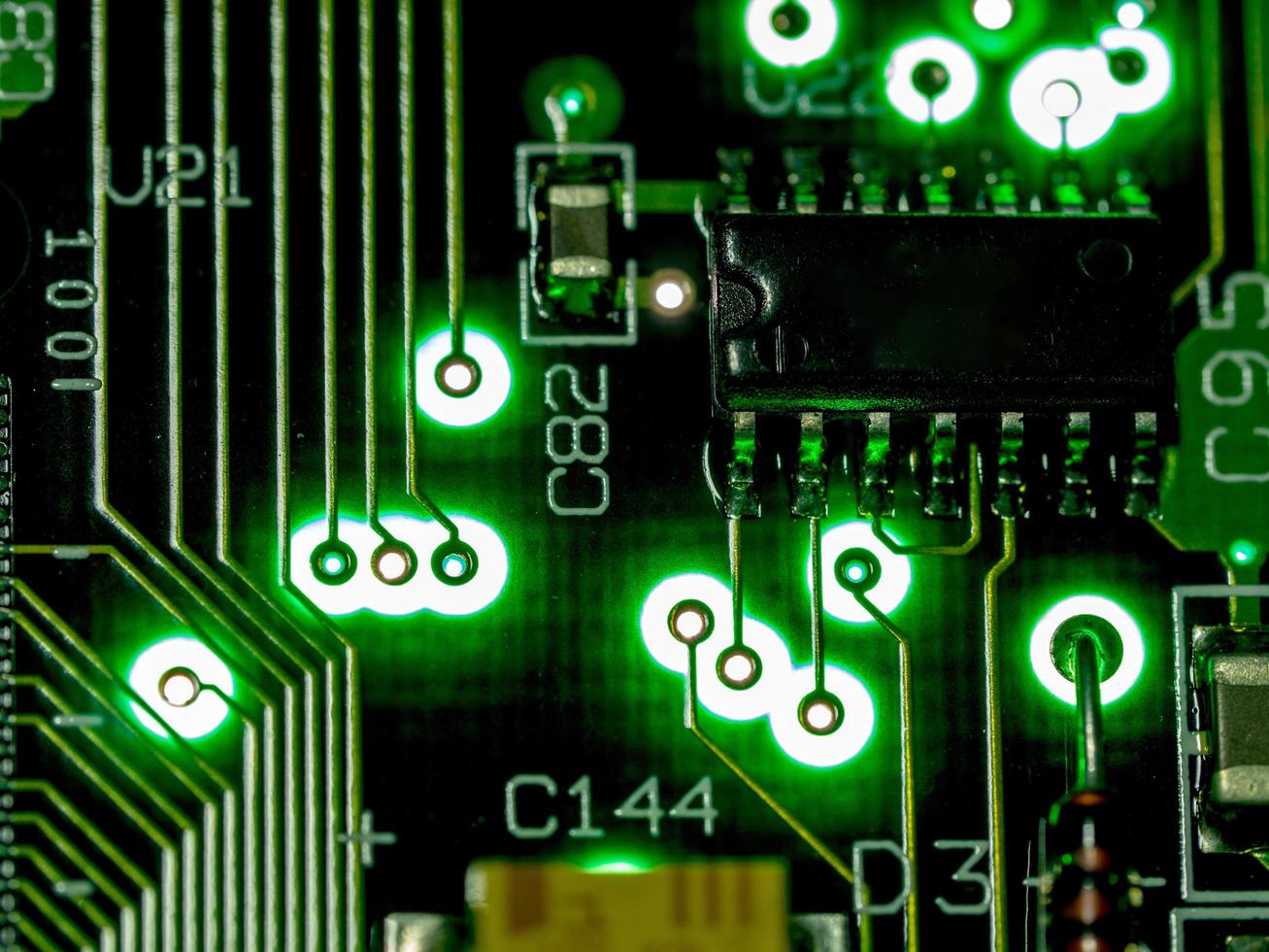Abstract background,close up green circuit board. Electronic computer hardware technology. Mainboard computer background. Integrated communication processor. Information engineering component. photo