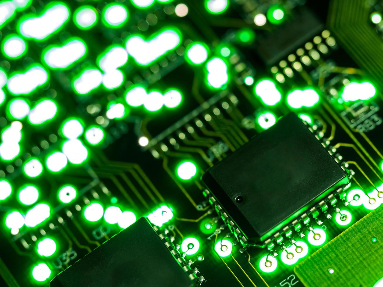 Abstract background,close up green circuit board. Electronic computer hardware technology. Mainboard computer background. Integrated communication processor. Information engineering component. photo