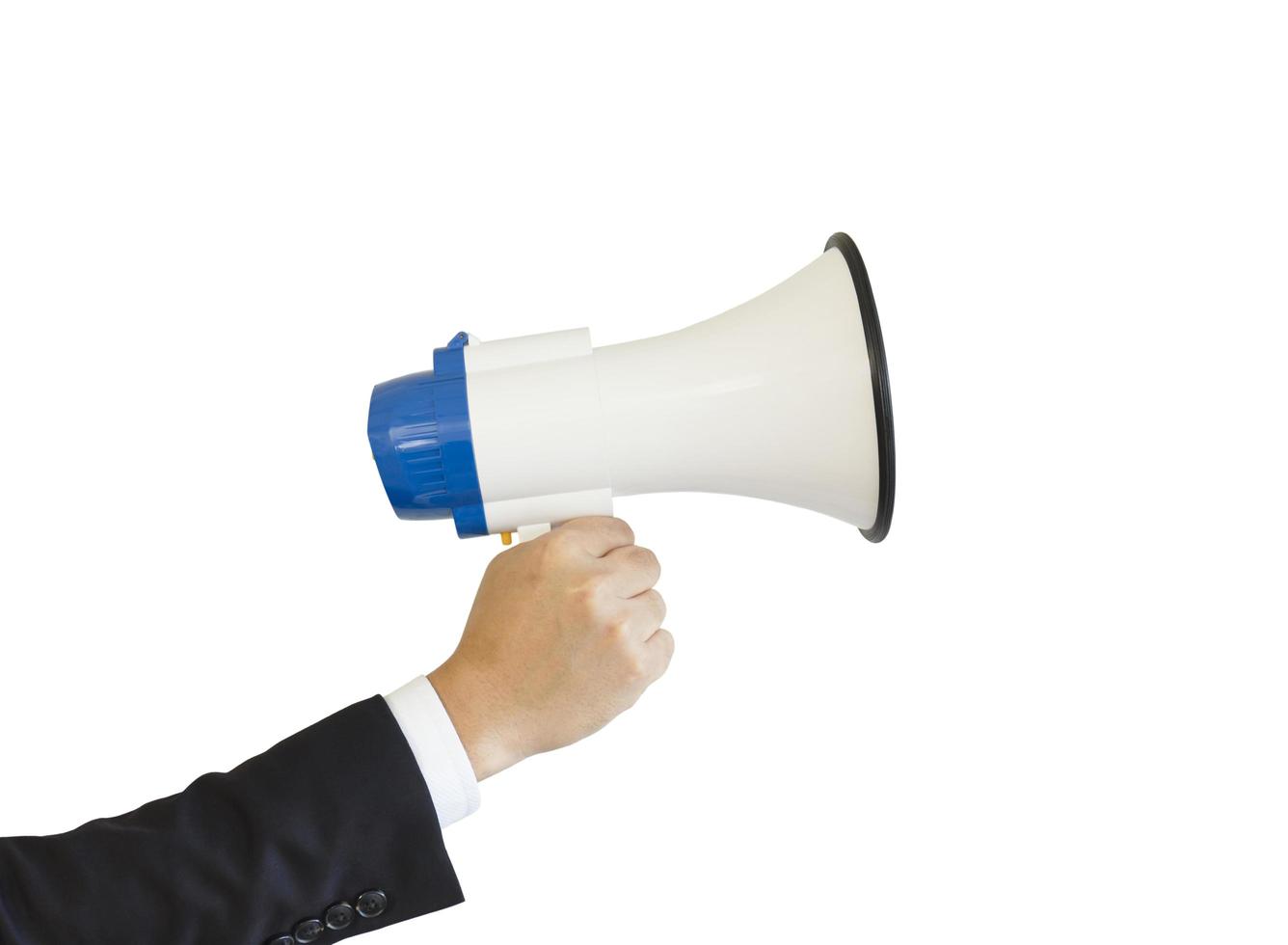 A man in a suit and holding a megaphone Isolated on white background. photo