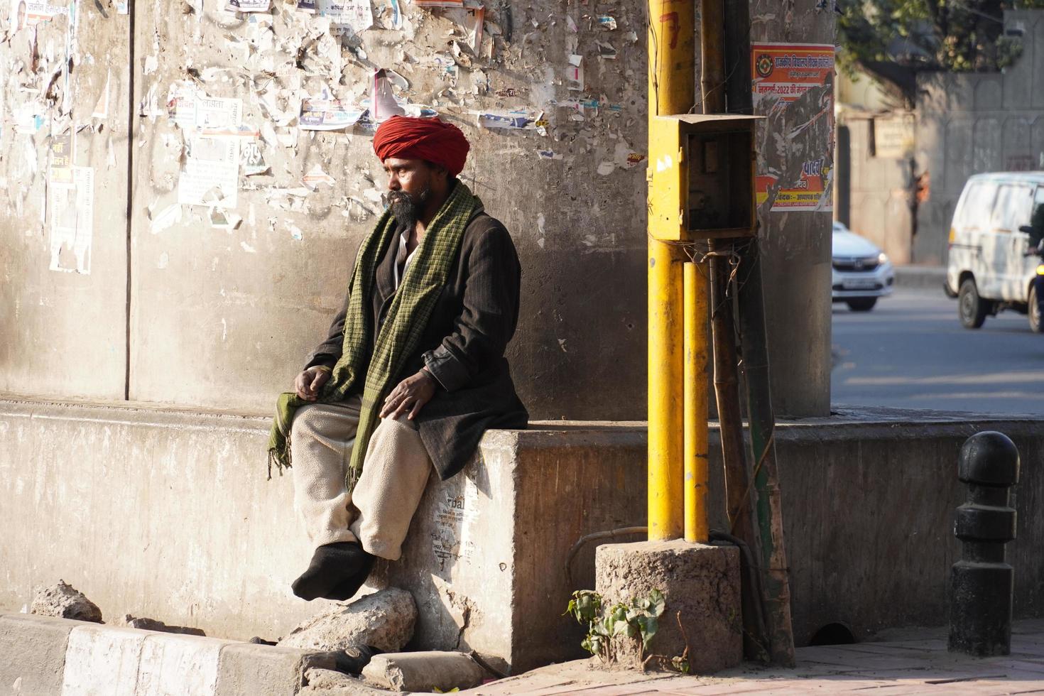 Poor homeless man in the street photo