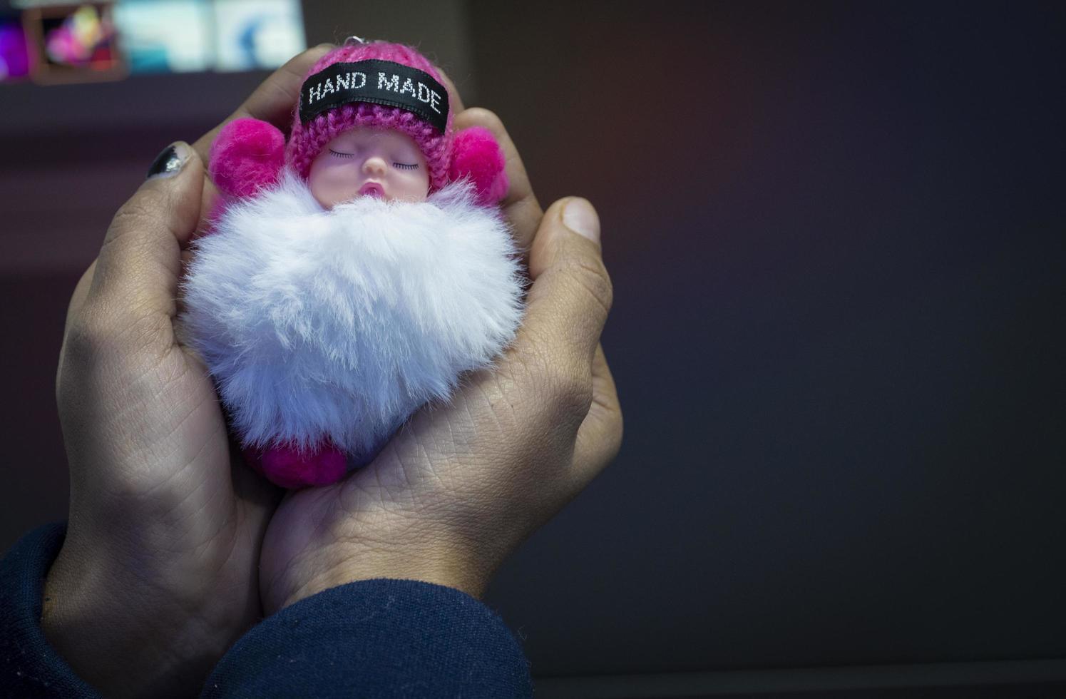 child baby Girl toy in hand photo