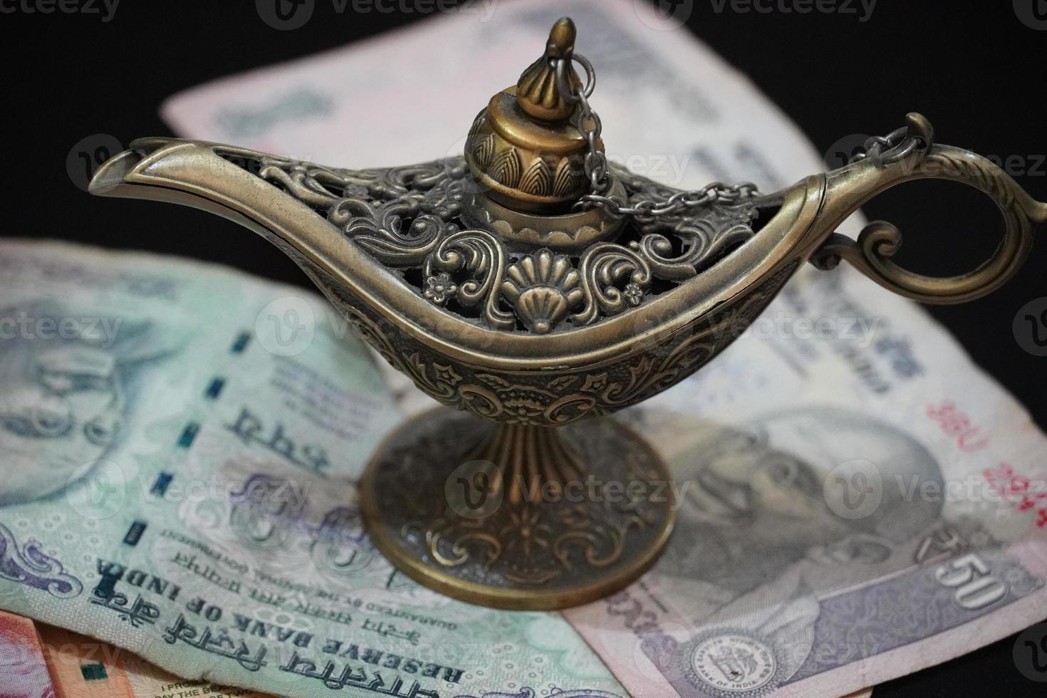 magical lamp with money photo