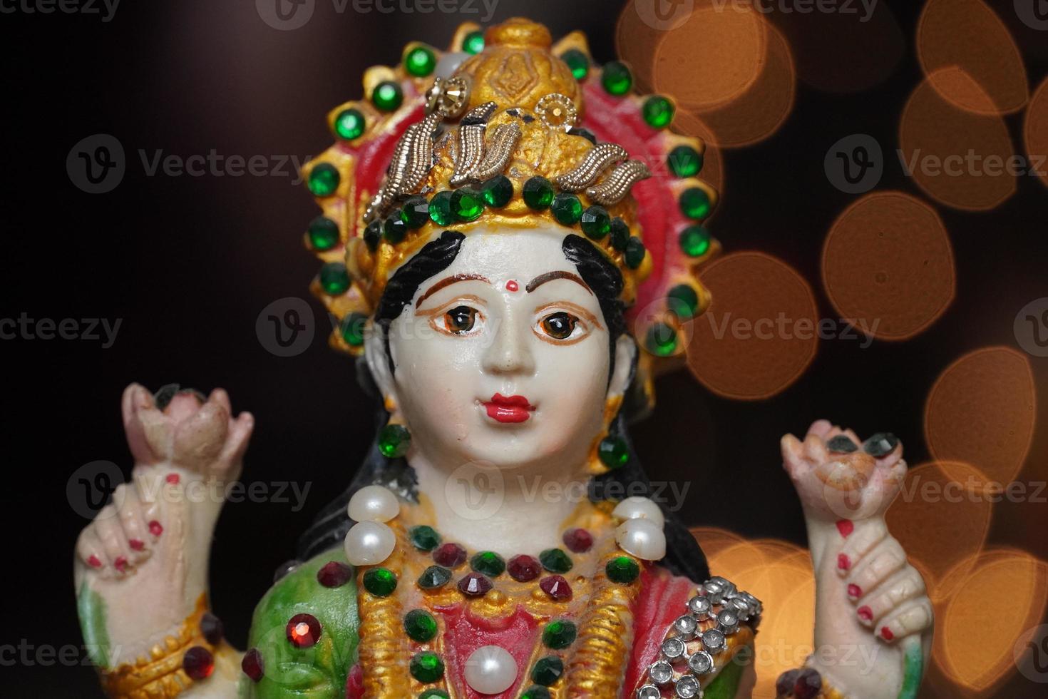 maa laxmi devi pooja image statue n diwali night photo