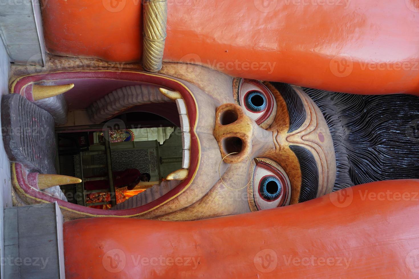 A close up view of the entrance of the imposing statue of Hanuman near Jhandewala metro station in New Delhi photo