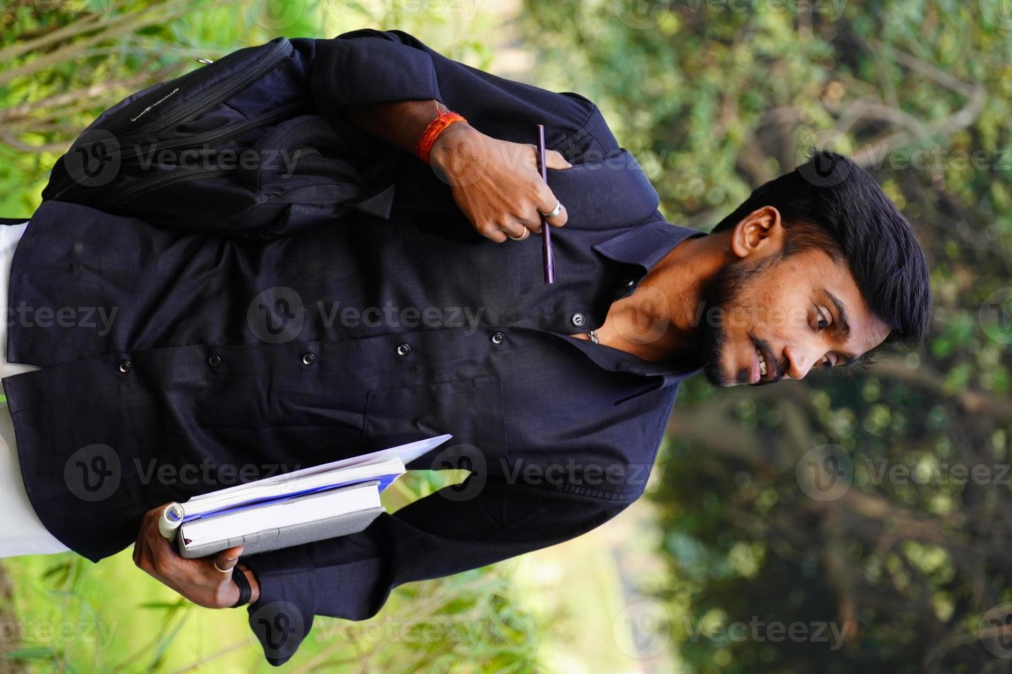 Indian student image student is going college with books and back photo