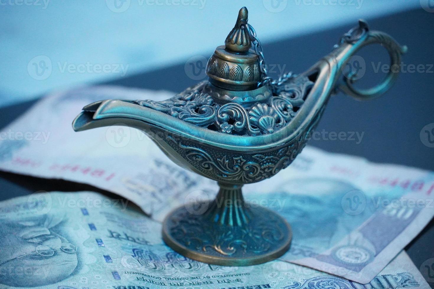 magical lamp with money photo