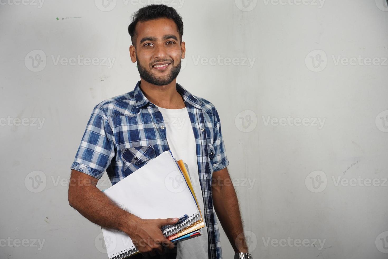 indian teacher with books photo