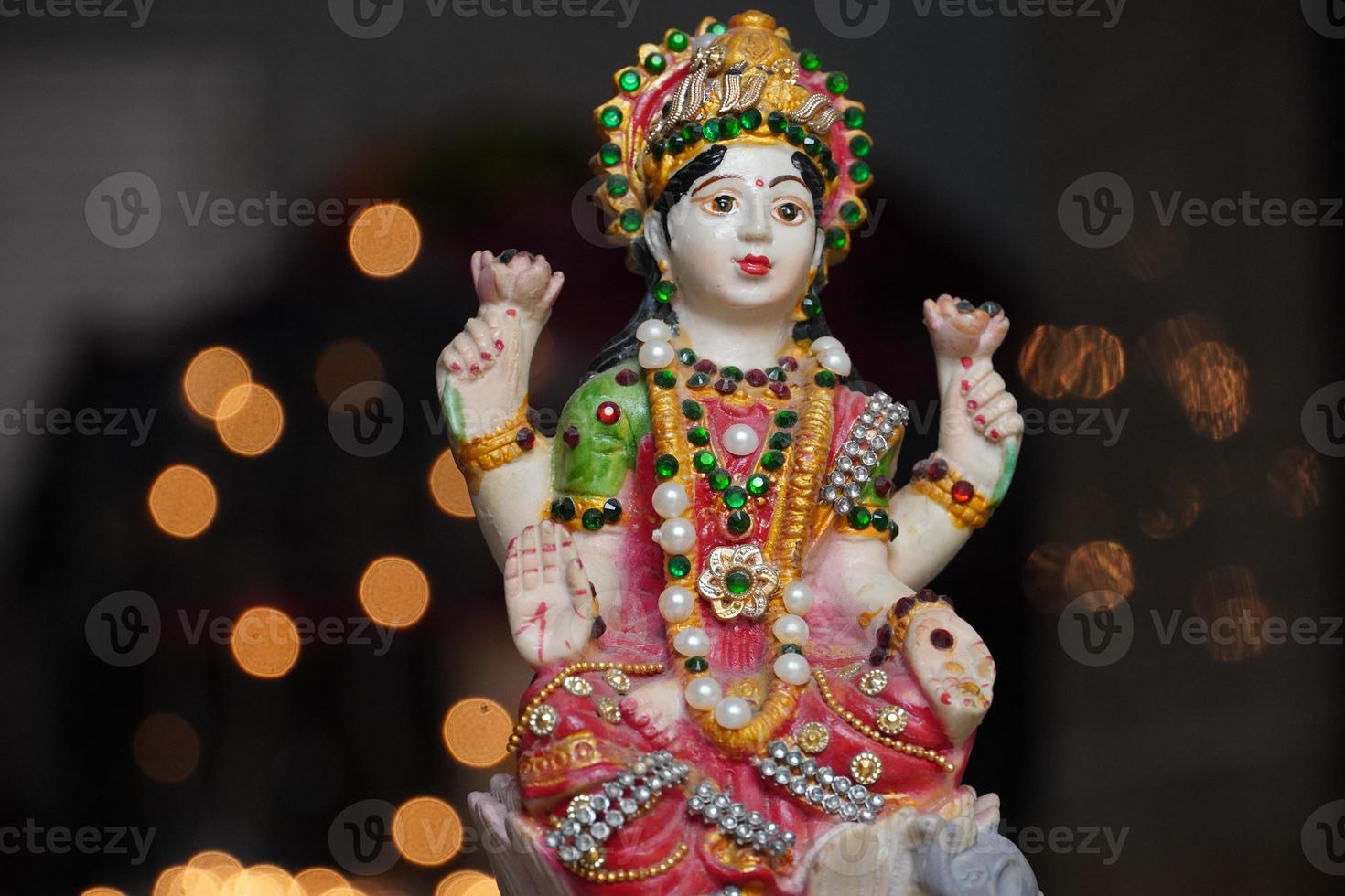 maa laxmi devi pooja image statue n diwali night photo