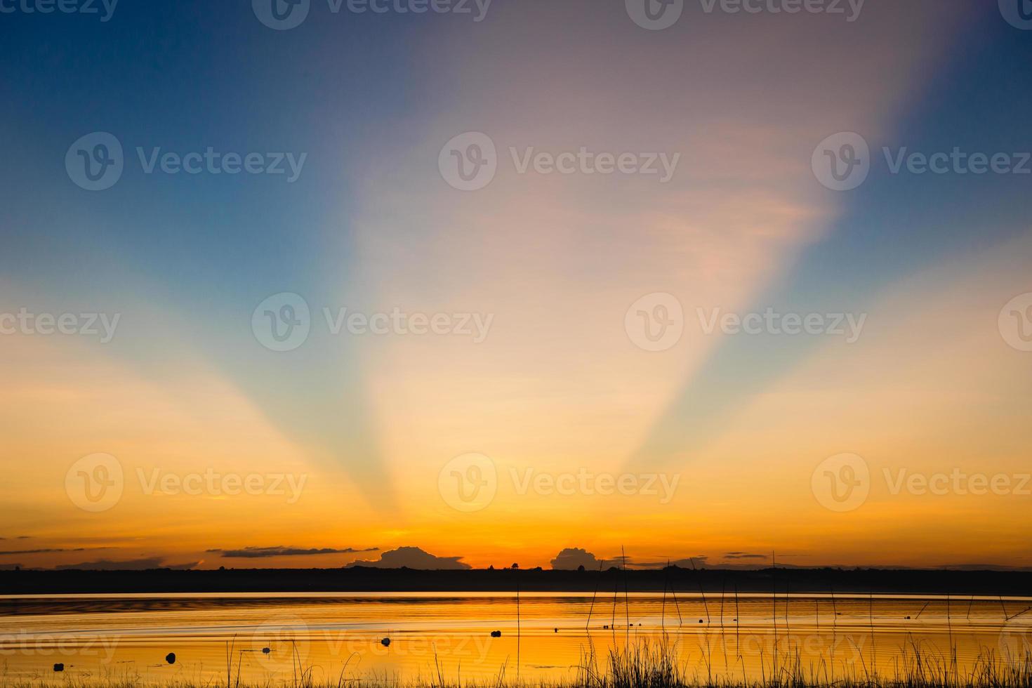 Evening light from sunset over the lake, Twilight splash concept photo