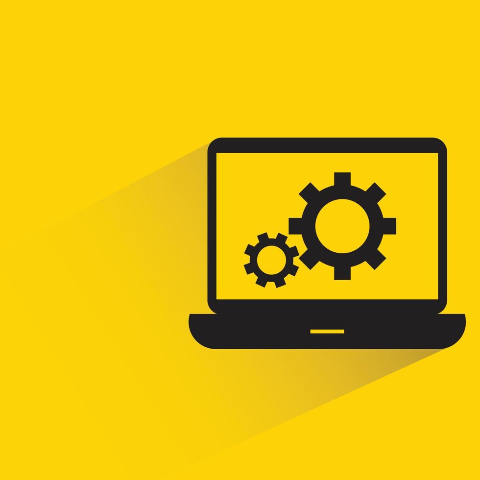 gears in laptop icon on yellow background vector