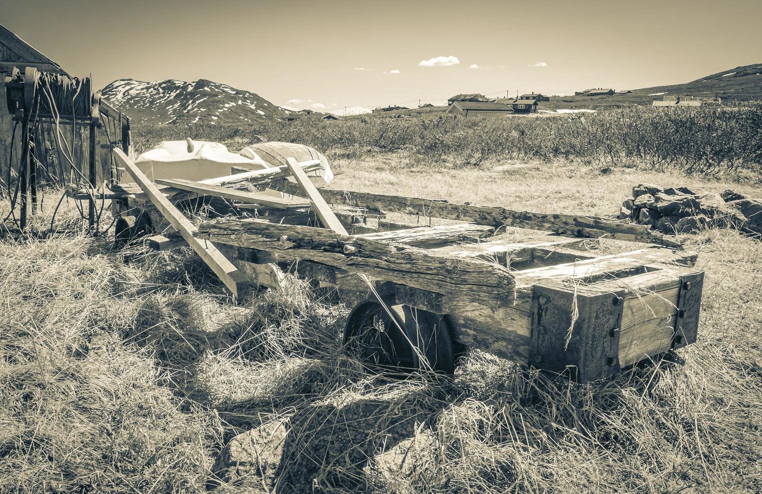 Idyllic hut with fishing boats near vavatn lake Hemsedal Norway. photo