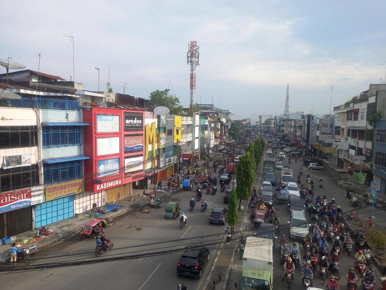 Medan, Indonesia - March 24, 2022 The morning traffic on Colonel Yos Sudarso street Brayan was taken from the top of the fly over brayan photo