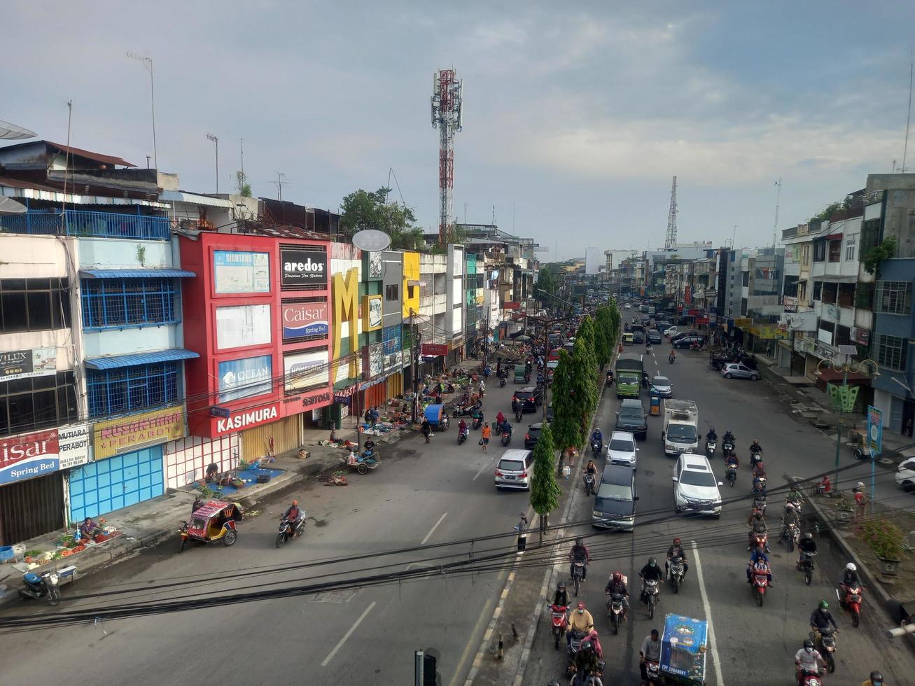 Medan, Indonesia - March 24, 2022 The morning traffic on Colonel Yos Sudarso street Brayan was taken from the top of the fly over brayan photo