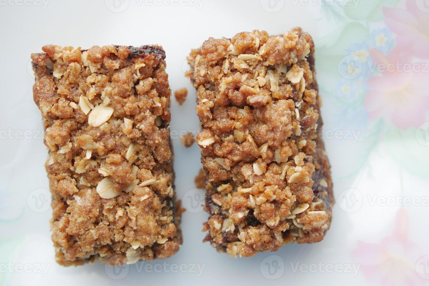 date fruit chocolate bar in a plate on table photo