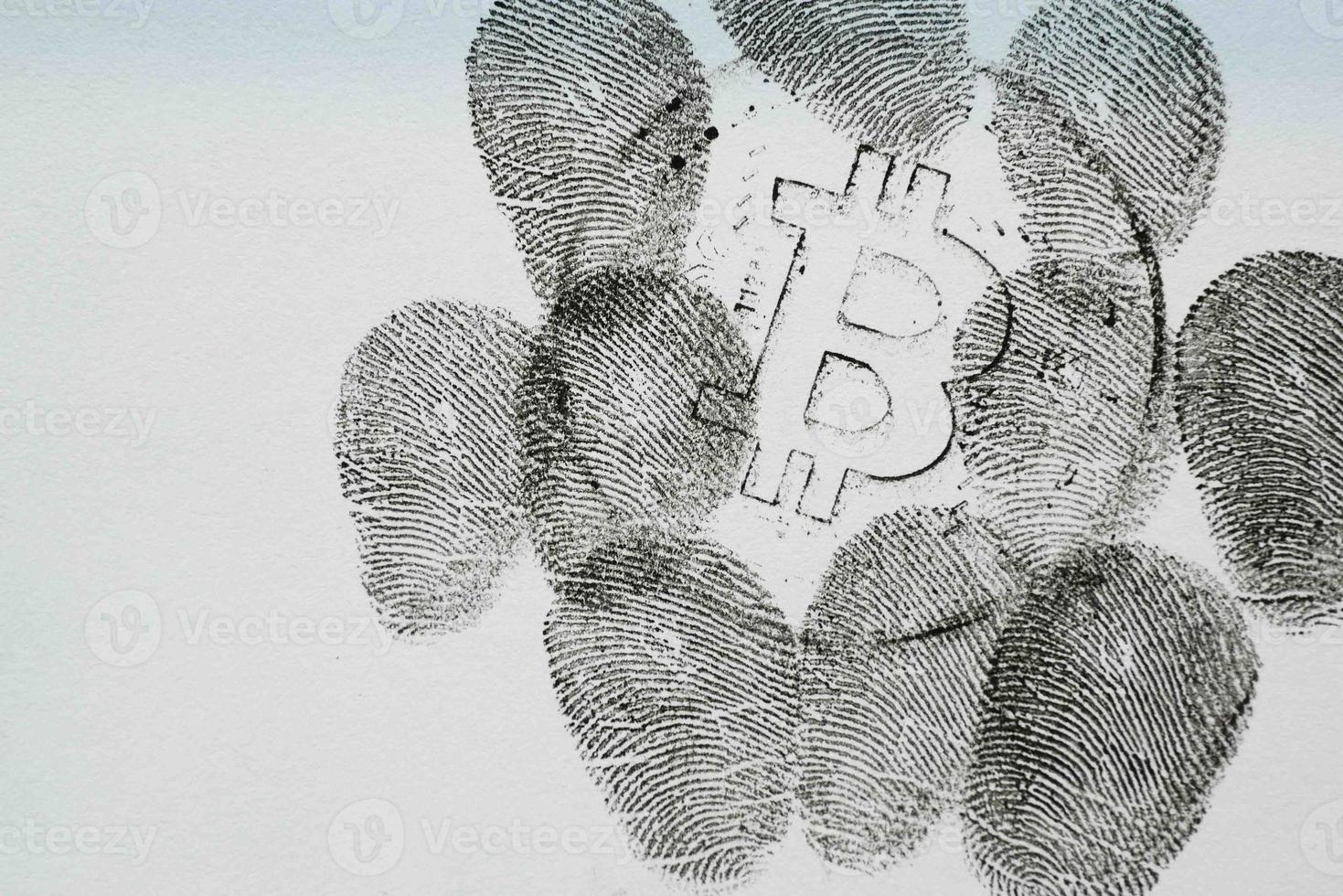 dhaka bangladesh, 21th January 2022, bitcoin sign and black fingerprints paper photo