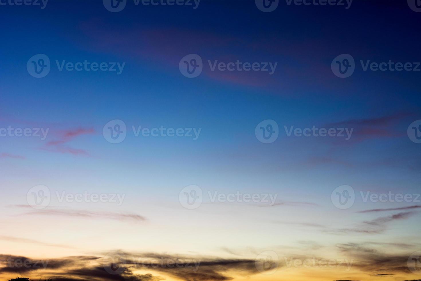 Blue sky background with beautiful clouds photo