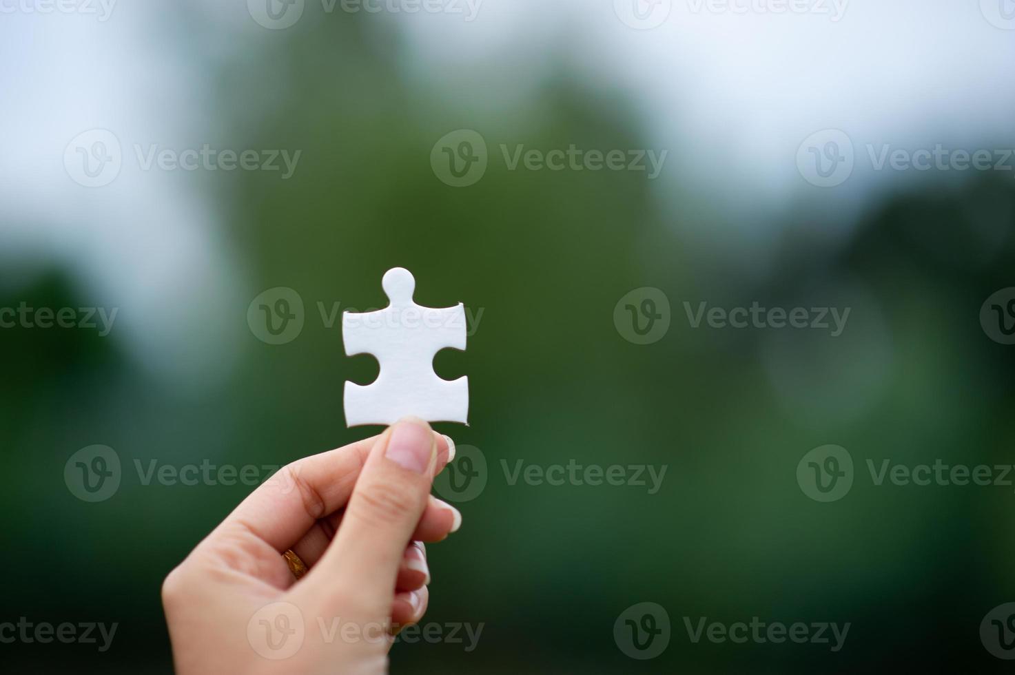 Hands and puzzles, important pieces of teamwork Teamwork concept photo