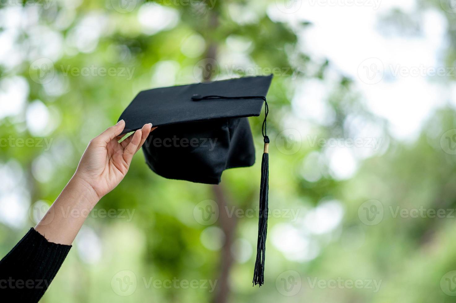 Graduates are expressing joy at graduation. He is a successful person - image photo