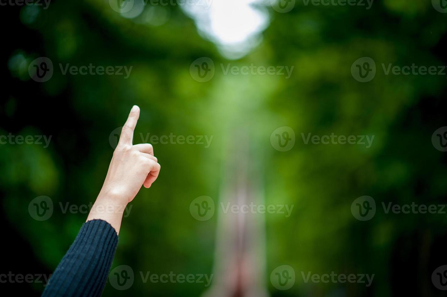 The hand pointed out, showing some command. photo