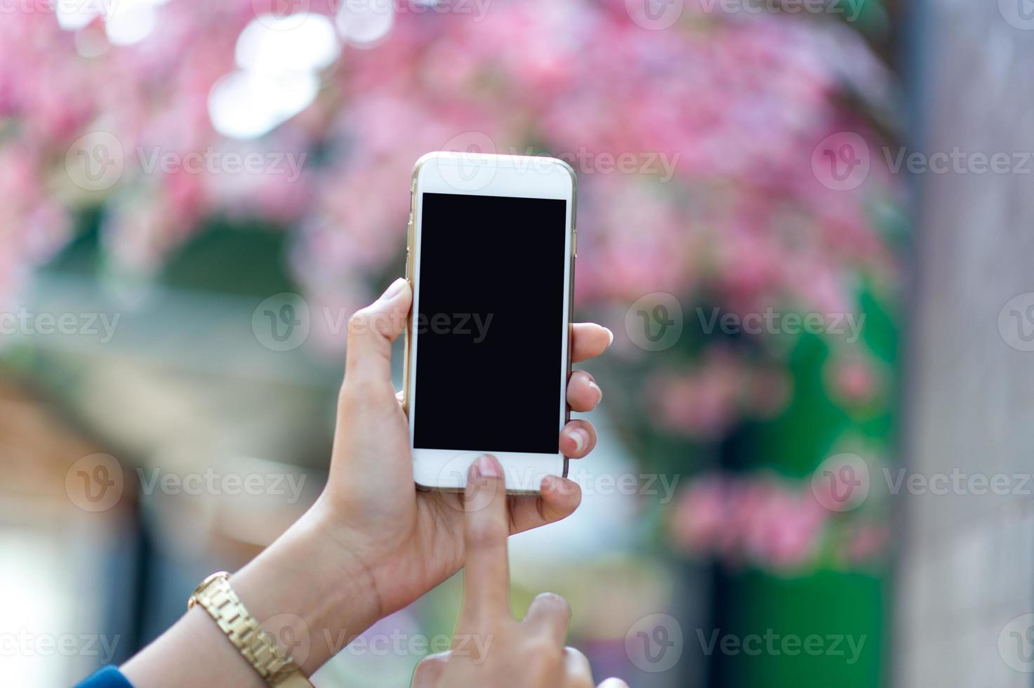 Hands and phones used for online communication Concepts of telephone and technology With copy space photo