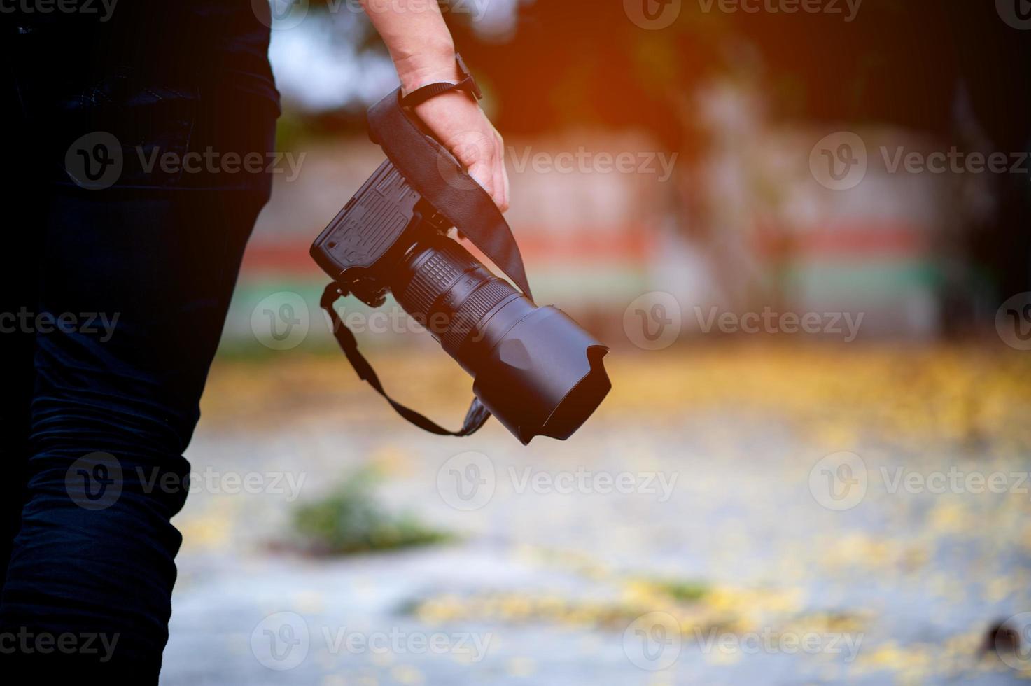 fotografía de mano y equipo fotográfico del fotógrafo concepto fotógrafo foto