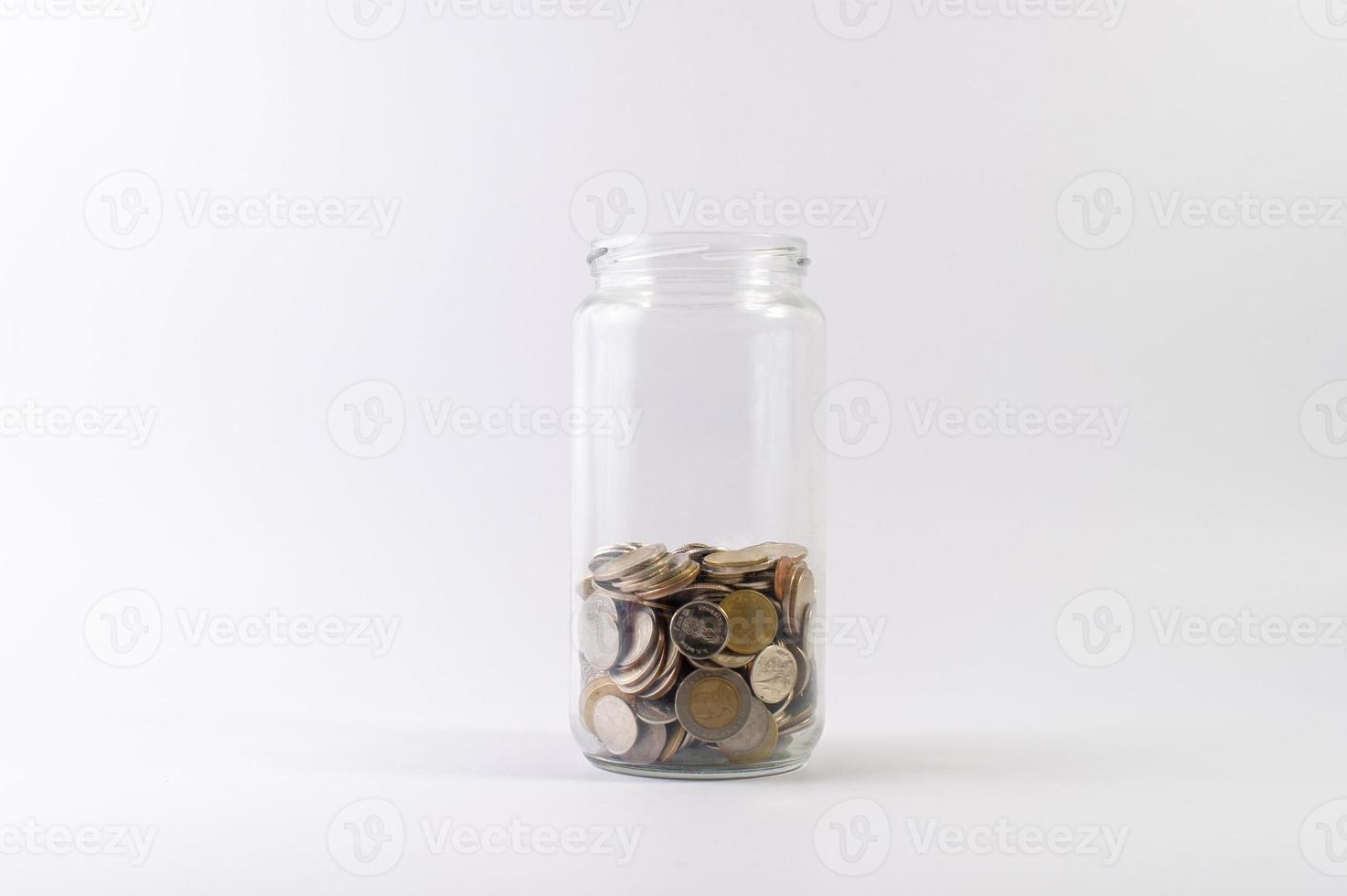 Saving money, saving money for the future ahead of life. And silver on a white background photo