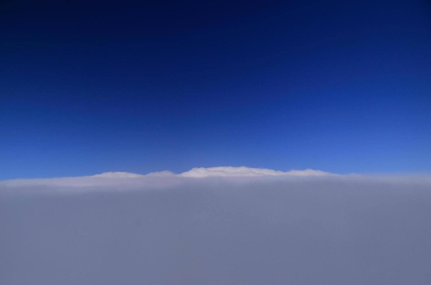 white wall of clouds on sky photo