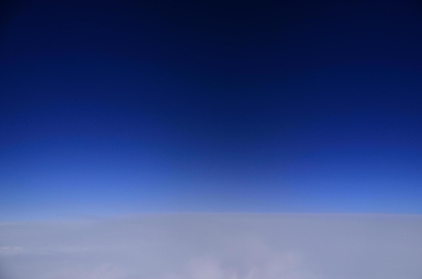 blue skies and white horizon photo