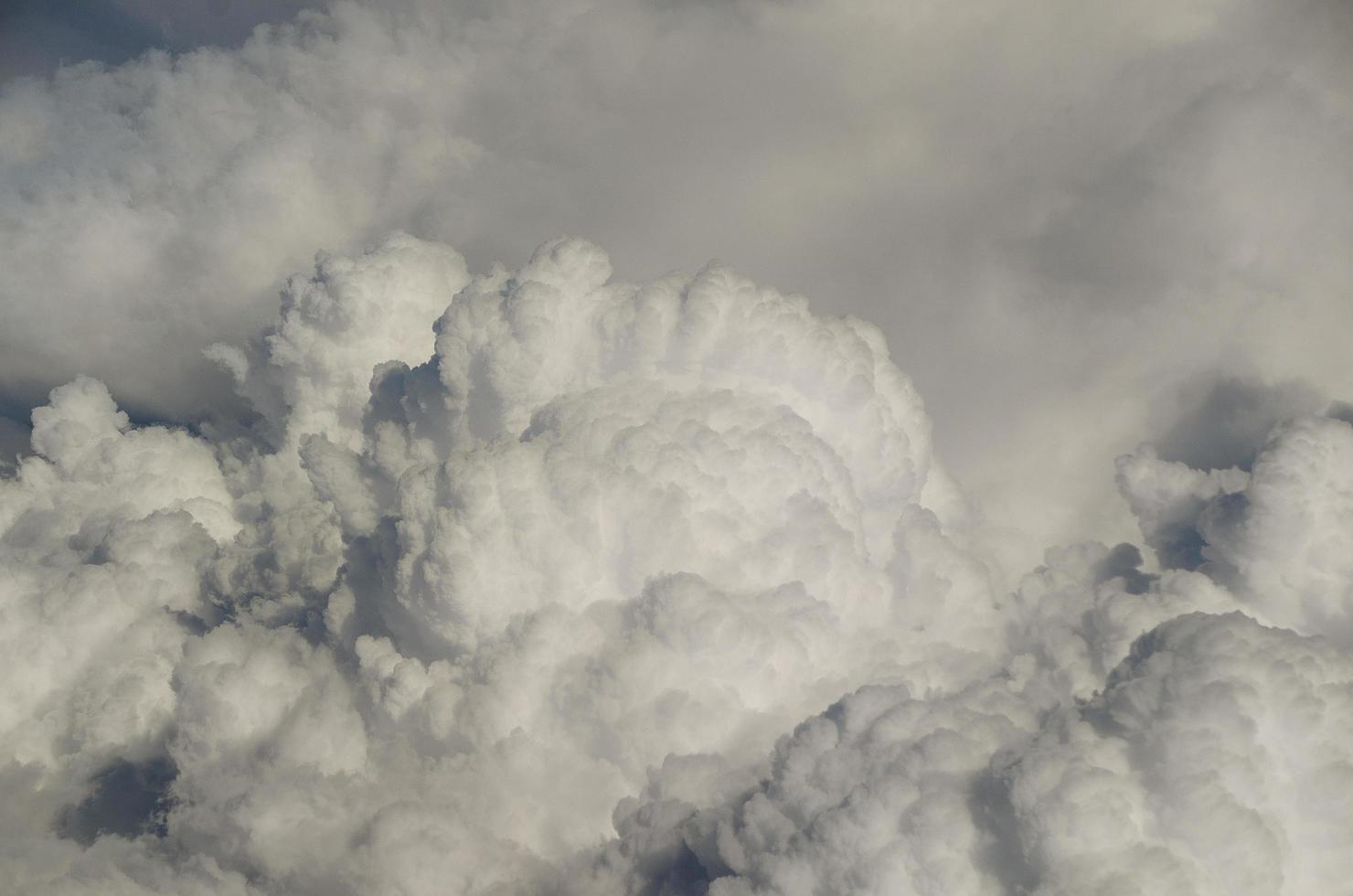 large white clouds from airplane photo