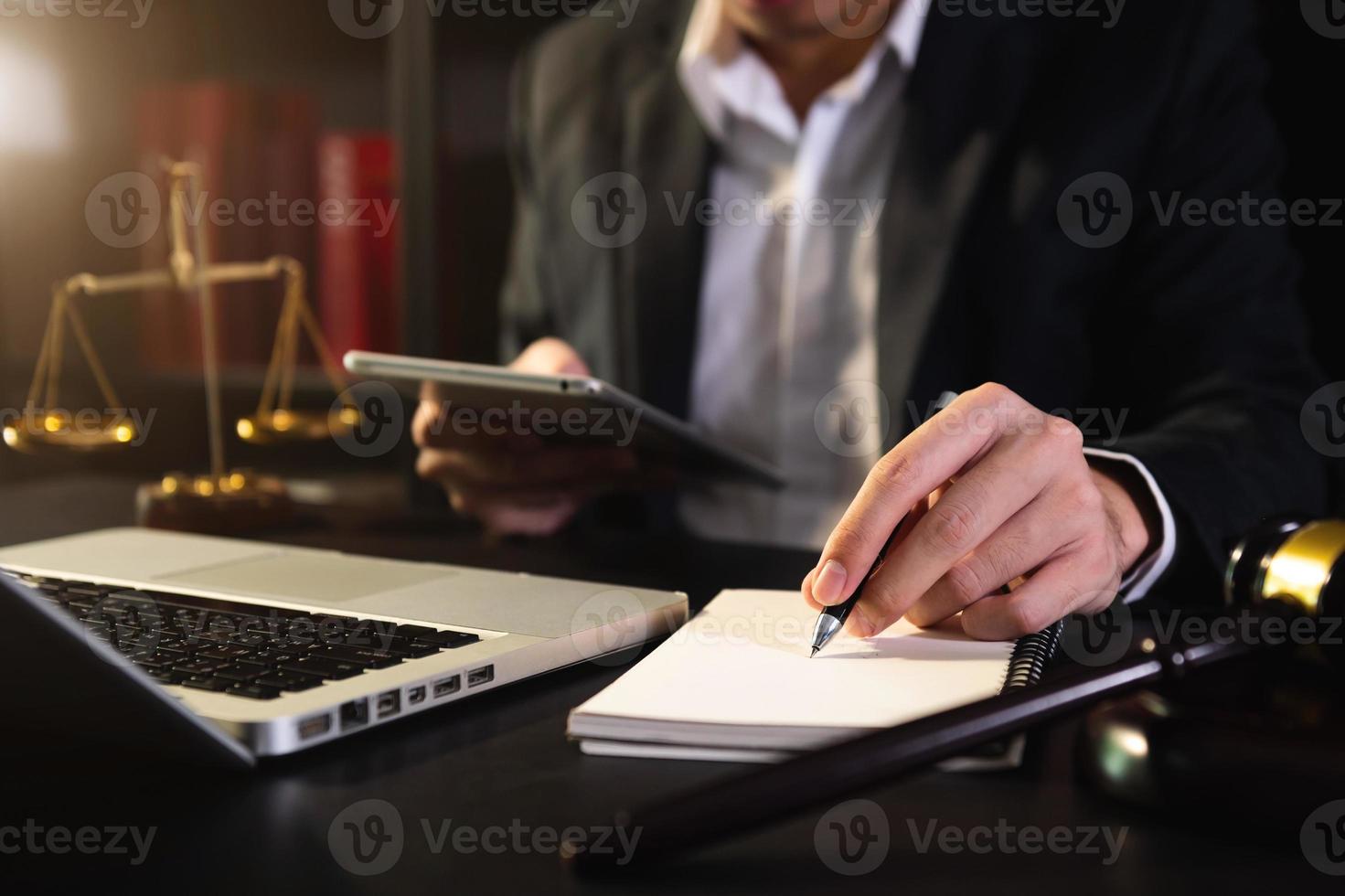 business people and lawyers discussing contract papers sitting at the table. photo