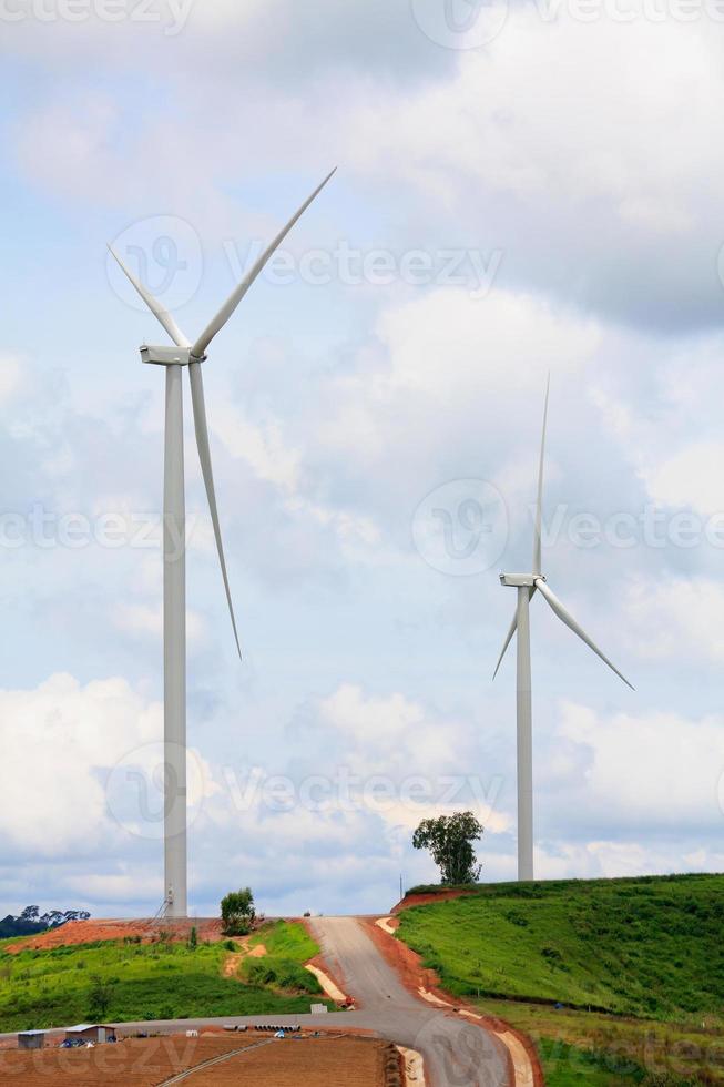 Wind turbines with the clouds and sky photo