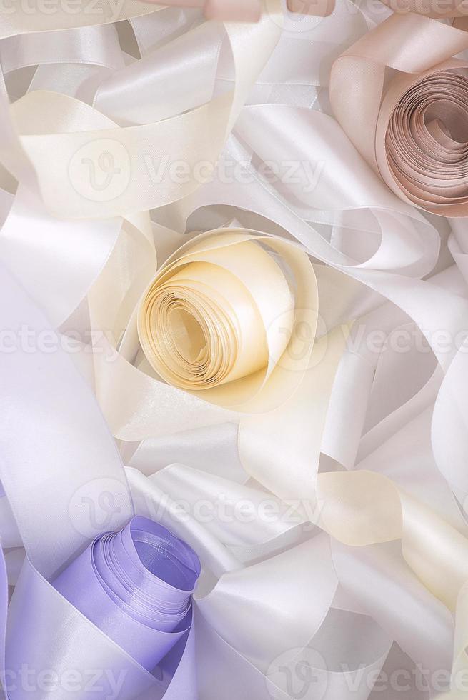 white and beige ribbon in sewing shop photo